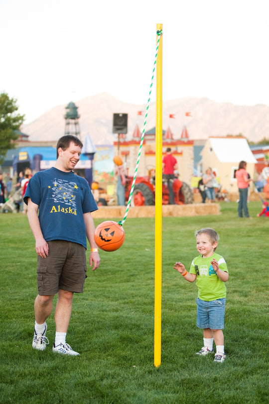 Tether Ball_Dad Son_Smiling Laughing.jpg